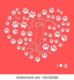 Nice picture of dog standing on its hind legs silhouette on a background of dog tracks and bones in the form of heart on a colored background.