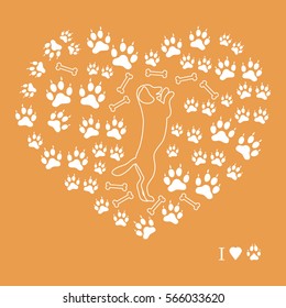 Nice picture of dog standing on its hind legs silhouette on a background of dog tracks and bones in the form of heart on a colored background.