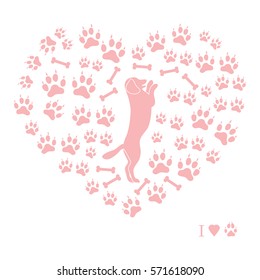 Nice picture of dog standing on its hind legs silhouette on a background of dog tracks and bones in the form of heart on a white background.