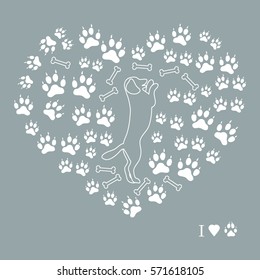 Nice picture of dog standing on its hind legs silhouette on a background of dog tracks and bones in the form of heart on a colored background.