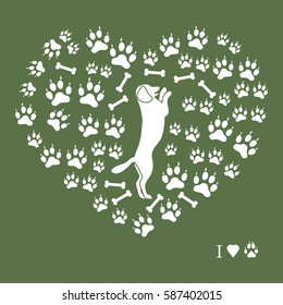 Nice picture of dog standing on its hind legs silhouette on a background of dog tracks and bones in the form of heart on a colored background.