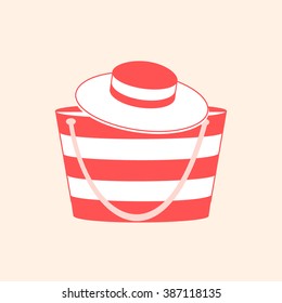 Nice picture with fashion summer accessories, hat and bag on a light background