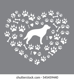 Nice picture of retriever silhouette on a background of dog tracks and bones in the form of heart on a colored background.