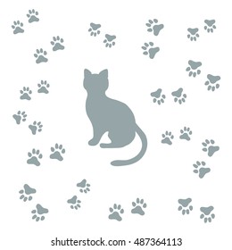 Nice picture of silhouette sitting cat and animal traces on a white background