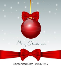 Nice red christmas balls with red bow on the snow background