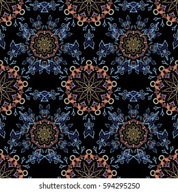 Nice vector hand-drawn illustration. Elegant seamless pattern with floral and Mandala elements.
