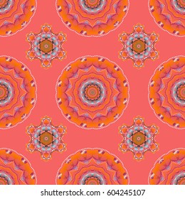 Nice vector hand-drawn illustration. Elegant orange, blue and pink seamless pattern with and Mandala elements.