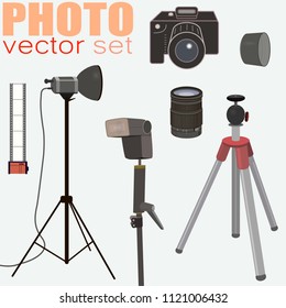 Nice vector set of photo equipment: camera, film 35mm, flash, lightning equipment, lens, lens hood, tripod. Suitable for web or printing.