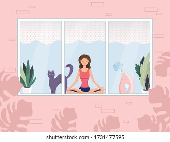 A nice young woman is sitting in a yoga and meditation pose with a cat next to her. Meditation, relaxation at home with a view from the window. Vector illustration.