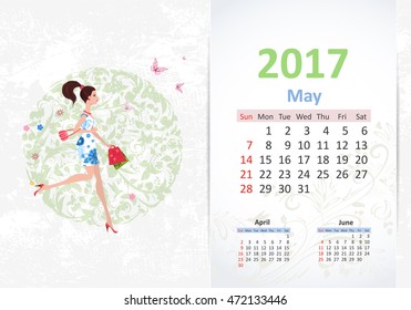 nice young woman walking with shopping bags. fun Calendar for 2017, May