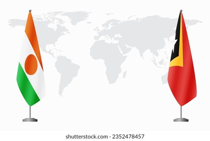 Niger- und Osttimor-Flaggen für offizielle Treffen vor dem Hintergrund der Weltkarte.