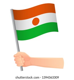 Niger flag in hand. Patriotic background. National flag of Niger vector illustration