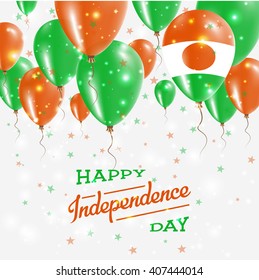 Niger Independence Day Celebration Balloons. Flying Rubber Celebration Balloons in Colors of the Niger National Flag. Happy Niger Day Celebration Balloons, Stars and Sparkles.