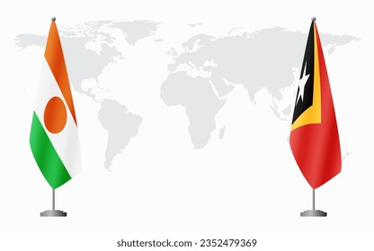 Niger and Timor-Leste flags for official meeting against background of world map.