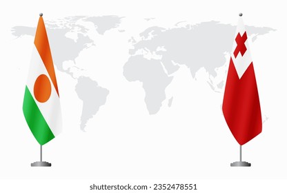 Niger and Tonga flags for official meeting against background of world map.