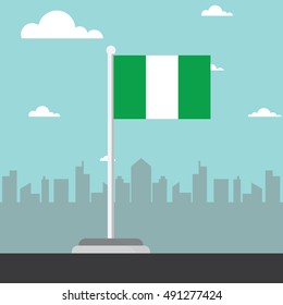 nigeria flag flat design with city background