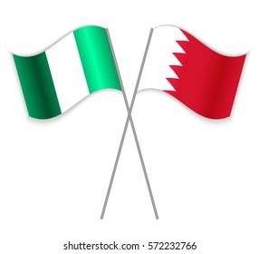 Nigerian and Bahraini crossed flags. Nigeria combined with Bahrain isolated on white. Language learning, international business or travel concept.