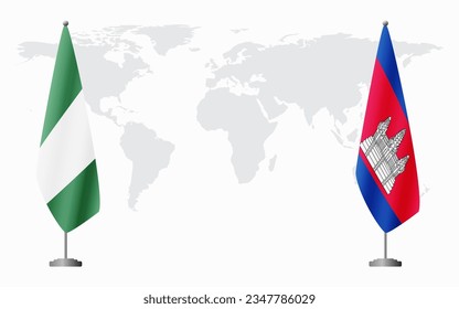Nigerian and Cambodia flags for official meeting against background of world map.