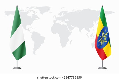 Banderas nigerianas y etíopes para una reunión oficial contra el fondo del mapa mundial.