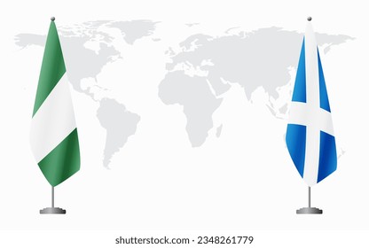 Nigerian and Scotland flags for official meeting against background of world map.