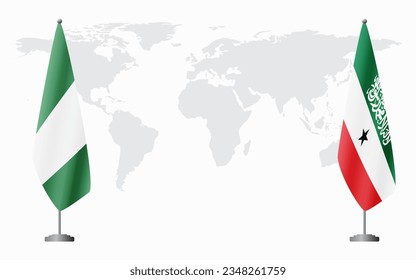 Nigerian and Somaliland flags for official meeting against background of world map.