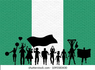 Nigerian supporter silhouette in front of brick wall with Nigeria flag. All the objects, silhouettes and the brick wall are in different layers. 