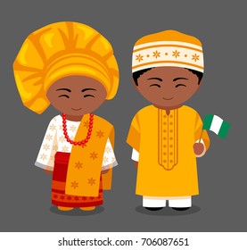 Nigerians in national clothes with a flag. Man and woman in traditional costume. Travel to Nigeria. People. Vector flat illustration.