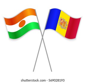 Nigerien and Andorran crossed flags. Niger combined with Andorra isolated on white. Language learning, international business or travel concept.