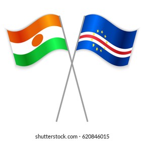 Nigerien and Cabo Verdean crossed flags. Niger combined with Cabo Verde isolated on white. Language learning, international business or travel concept.