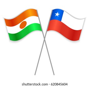 Nigerien and Chilean crossed flags. Niger combined with Chile isolated on white. Language learning, international business or travel concept.