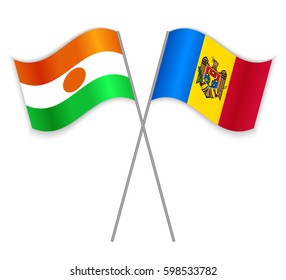 Nigerien and Moldovan crossed flags. Niger combined with Moldova isolated on white. Language learning, international business or travel concept.