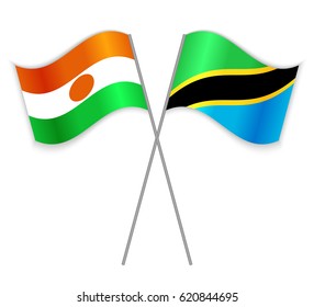 Nigerien and Tanzanian crossed flags. Niger combined with Tanzania isolated on white. Language learning, international business or travel concept.