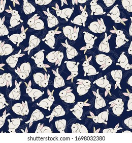 Night background with funny rabbit. Seamless pattern fabric desing