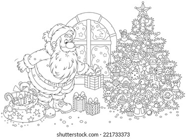 The night before Christmas, Santa Claus putting his holiday gifts under a decorated fir