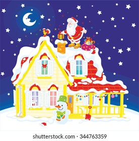 The night before Christmas, Santa Claus putting his holiday gifts in a chimney on a snow-covered roof of a house