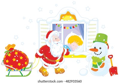 The night before Christmas, Santa Claus bringing his holiday gifts for a little boy sleeping in his bedroom