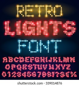 Night city alphabet with show lamps, for bllboard or sign. Vector font set