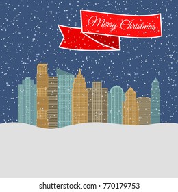 Night city with falling snow and a red ribbon with the inscription Happy Christmas. Vector illustration.