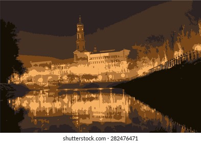Night city. View of the river and the bell tower. Highlighting the seafront lights.
Warm colors.