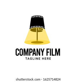 Night Lamp film maker logo design. Film strip with Night lamp vector illustration for movie studio production graphic template.