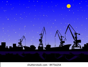 Nachtlandschaft. Im Hafen des Be- und Entladens von Frachtschiffen.