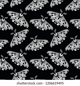 Night moth seamless pattern.. Butterfly pattern. Vector illustration of a butterfly on a black background. Use on the T-shirt and textile