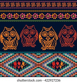 Night owls. Bohemian seamless pattern. Gypsy and Peruvian motifs. Blooming flowers, pagan owls, doodle prints, geometric triangles border. Folk art textile collection. Dark blue, red, golden.