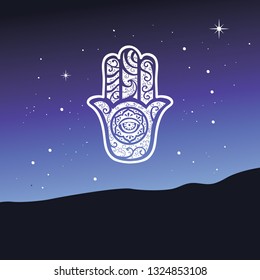 night sky with Ancient Middle Eastern amulet symbolizing the Hand of God.