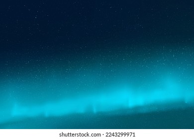 Night starry sky and aquamarine Northern lights. Blue aurora borealis