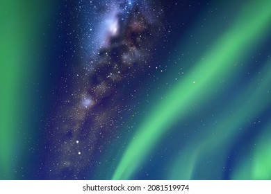 Night starry sky. Milky Way and Northern lights. Green aurora borealis