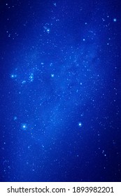 Night starry sky. Stars and nebula. Blue vertical space background