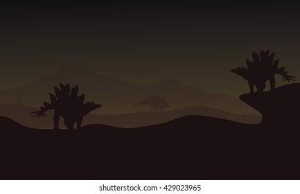 At night Stegosaurus in hills scnery silhouette a very beautiful