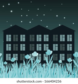 Night street with buildings and flowers