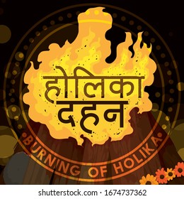 Night view of incandescent pyre celebrating Holika Dahan (text written in Sanskrit calligraphy) -or burning of Holika- with wooden logs, cow dungs, marigold flowers and a rounded label with greeting.